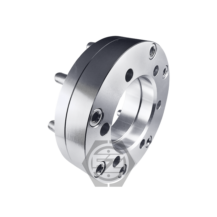 The Hub Centric Wheel Adapter 5x5.5 to 8x170 features a silver, CNC-machined circular design with multiple edge bolts and a hollow center, highlighting its metallic finish against a white background.