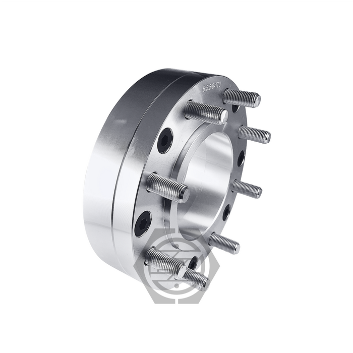 The Hub Centric Wheel Adapter 5x5.5 To 8x170 (Pair) is a CNC machined silver wheel spacer with six protruding bolts, seen angled on a white background, essential for adapting from 5 lug to 8 lug.