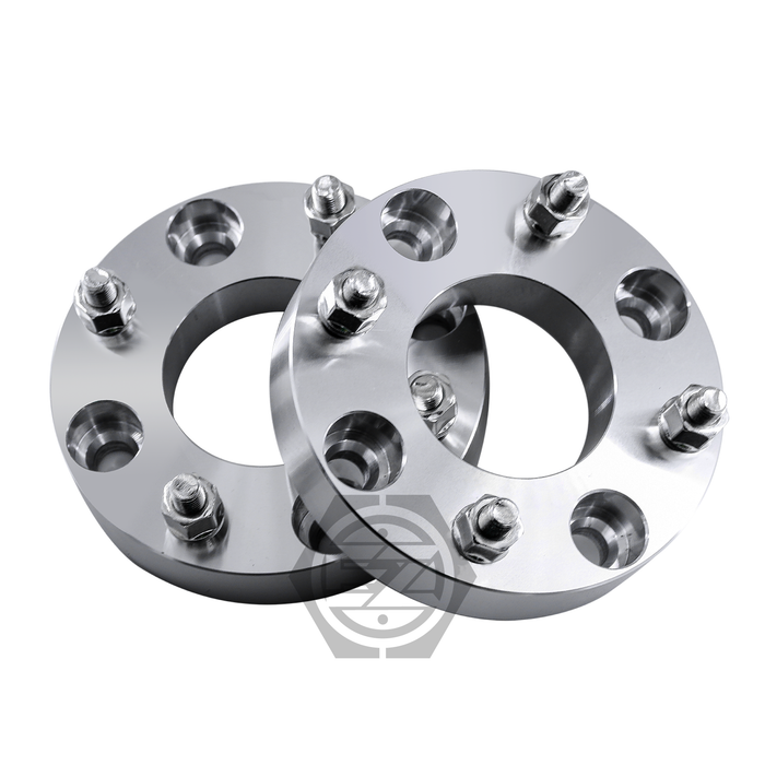 The ATV Wheel Adapter 4 Lug 156 To 4 Lug 110 (Pair) is made of shiny billet aluminum with multiple bolt holes and studs, CNC machined for precision, and set at an angle on a white background.