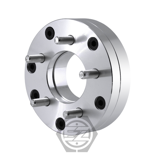 A shiny, silver Wheel Adapter 4 Lug 130 To 5 Lug 112 features six bolts in a circular pattern around a central hole. Upright on a reflective surface, the logo is visible at the bottom, ideal for enhancing your Mercedes wheels.