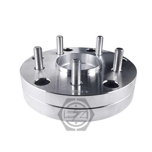 The Hub Centric Wheel Adapter 4x100 To 5x120 features a shiny, metallic design with six bolts and an inner ring. A flat base displays the EZ interlocking hexagon logo, and its reflective silver finish is ideal for BMW wheels. Thickness: 1.5 (Pair).