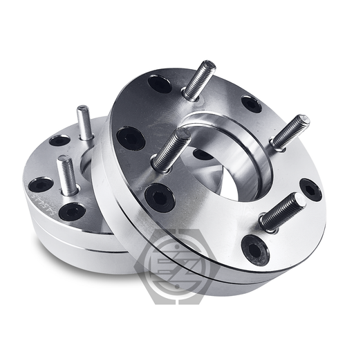 A pair of shiny, metallic wheel adapters made from CNC machined billet aluminum are stacked on a white background. Designed for a 5 lug adapter setup, they feature multiple bolts and holes with a visible logo.