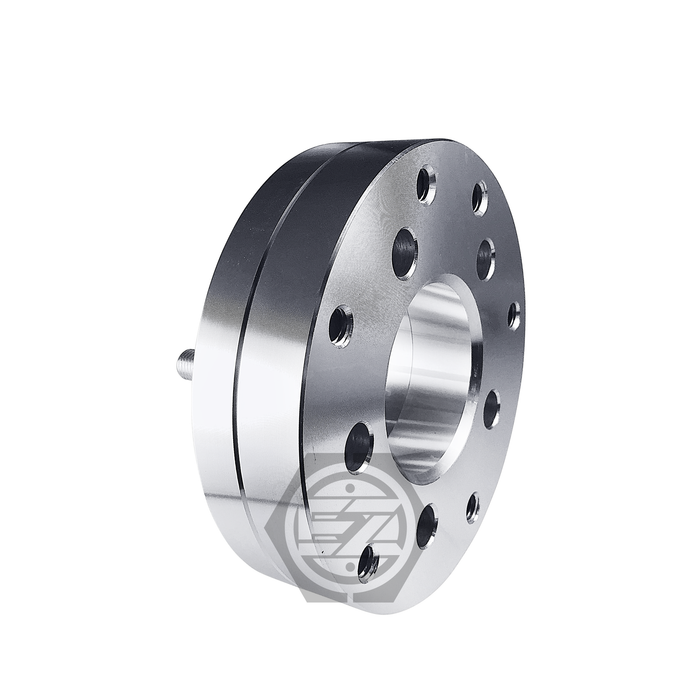 The Wheel Adapter 5 Lug 4.5 To 4 Lug 4.5 with a thickness of 1.75 is crafted from CNC machined billet aluminum, featuring multiple holes in a circle and a shiny, smooth finish—perfect for bolt pattern conversion requirements.