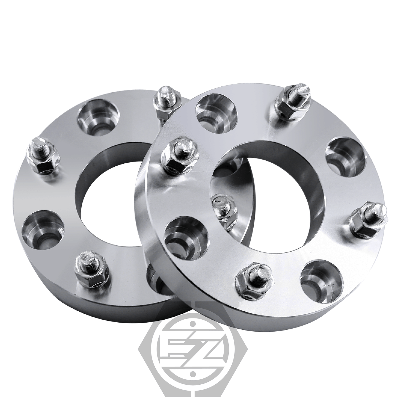 A pair of shiny silver wheel adapters, CNC machined from billet aluminum, showcases multiple holes and bolts on a white background. Near the bottom, a logo with stylized letters emphasizes their premium quality as Wheel Adapter 4 Lug 4.25 To 4 Lug 100 (Pair).
