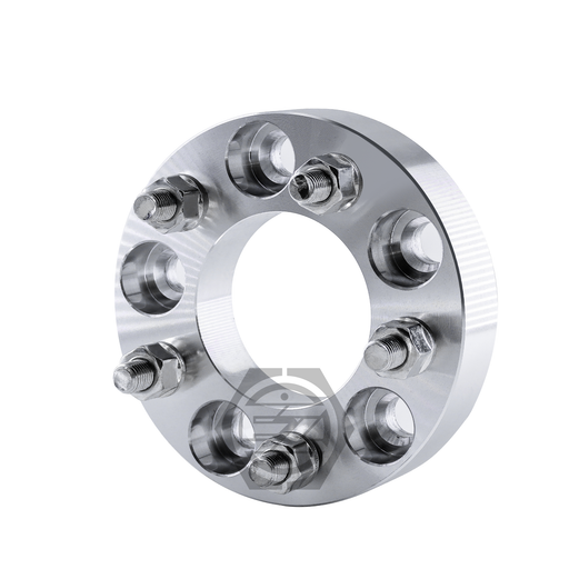 The Wheel Adapters 5x4.5 to 5x4.5 with 1/2 Studs are crafted from billet aluminum, featuring six protruding bolts for a seamless fit between a car wheel and hub. The shiny silver finish and hollow center enhance its sleek appearance.